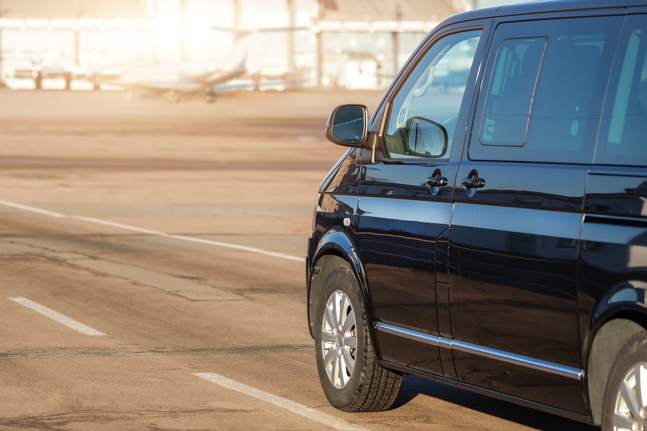 Side,Back,View,Of,Black,Vip,Service,Van,Running,On Side,Back,View,Of,Black,Vip,Service,Van,Running,On