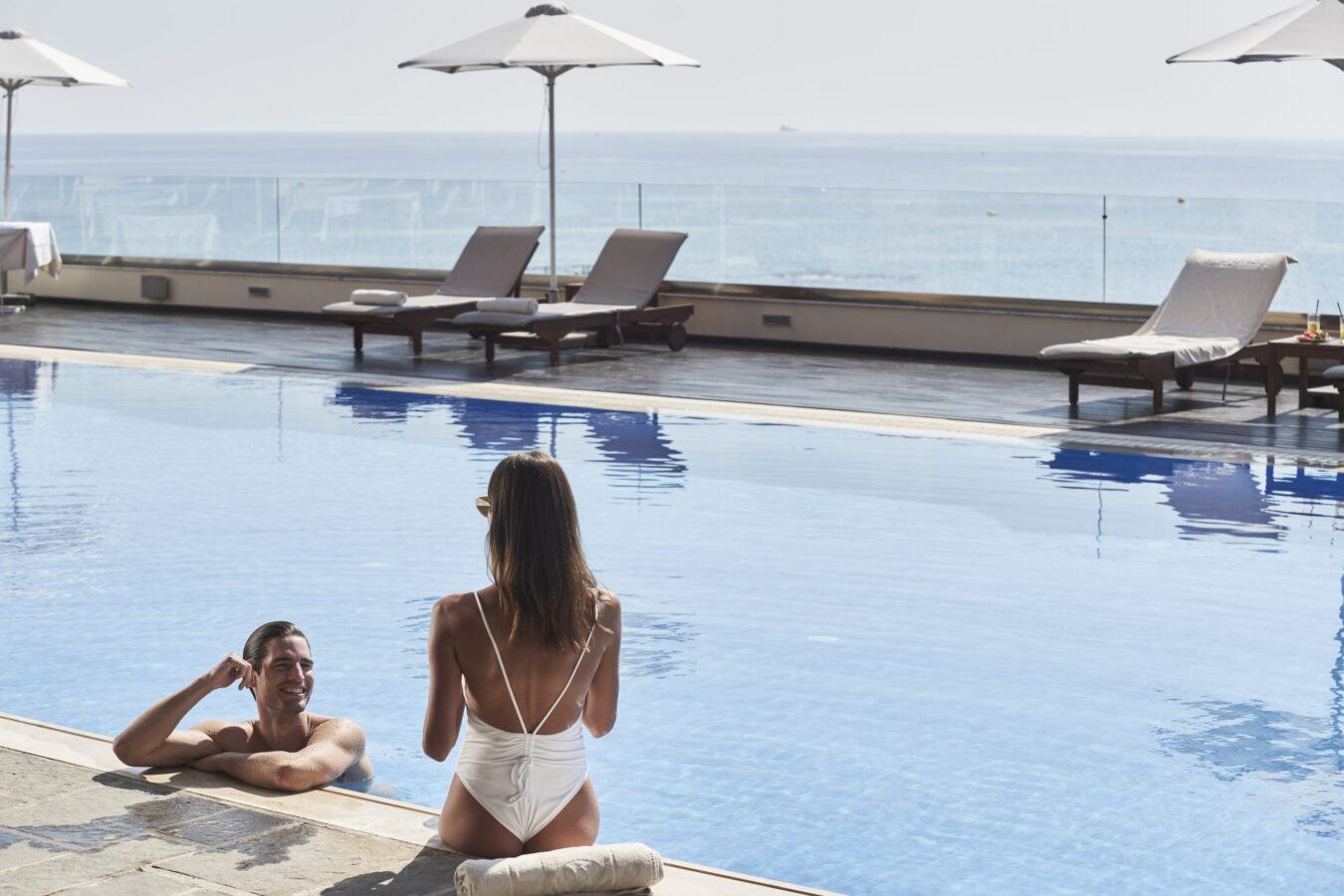 Chilling in the pool at Boutique 5, the best resort in Rhodes for couples by H Hotels